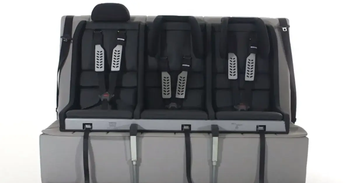 Three Car Seats in the Back of a Jeep Wrangler